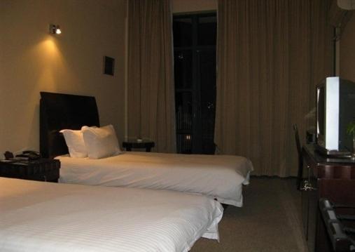 Baolong Homelike Hotel - Wusong Branch Shanghai Chambre photo